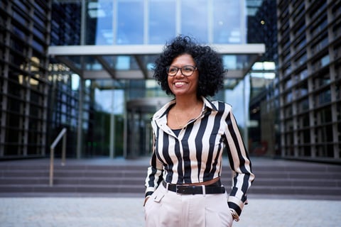 Professional black woman entrepreneur with curly hair success